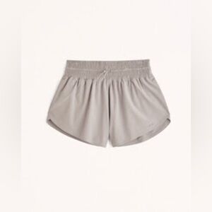 Abercrombie & Fitch YPB MotionTEK Ultra High Rise Lined Flyaway Shorts in Oat